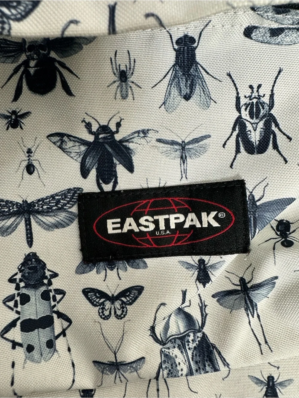 Eastpak White Backpack with Black Insect Print